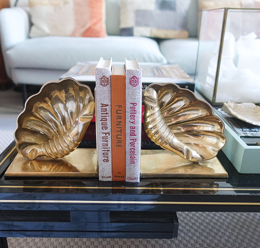 Pair of brass shell bookends