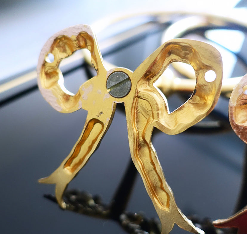 Hollywood regency brass bow towel ring