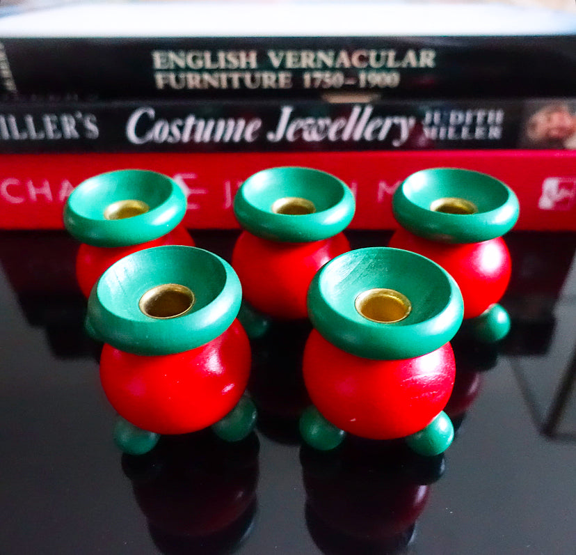 Set of five Swedish folk art candle holders