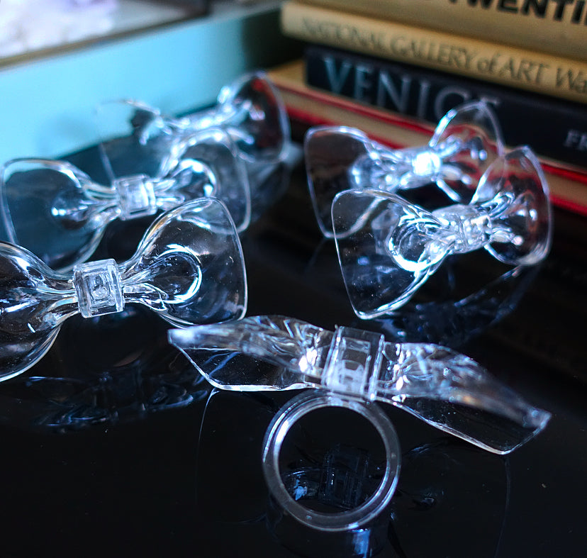 Set of six acrylic bow napkin rings