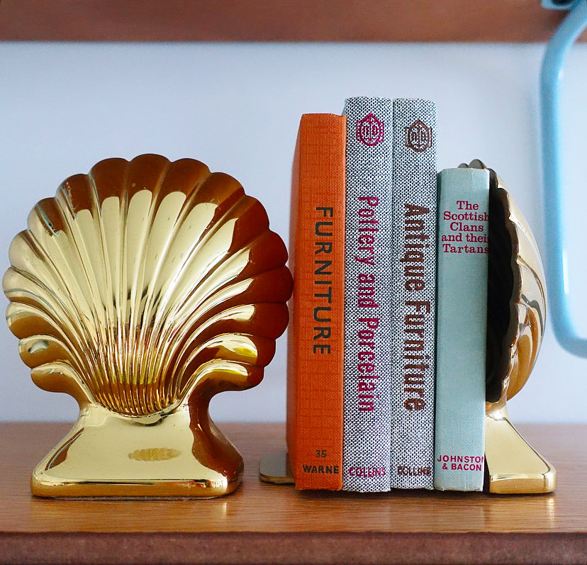 Pair of Hollywood Regency brass shell bookends