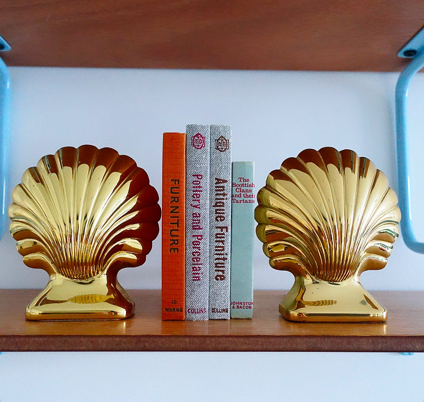 Pair of Hollywood Regency brass shell bookends