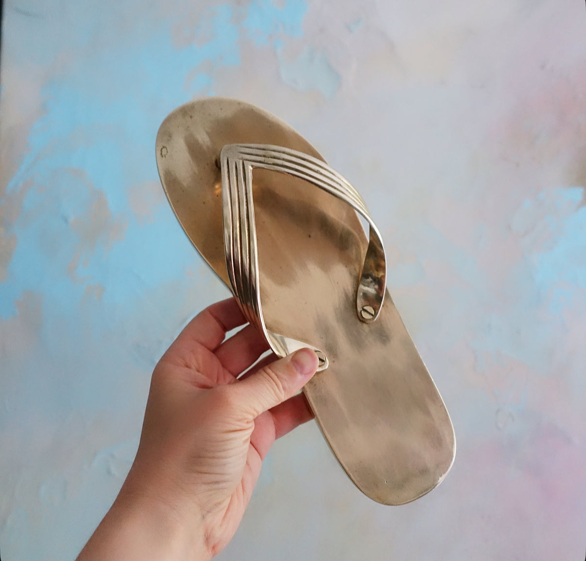 Brass flip flop