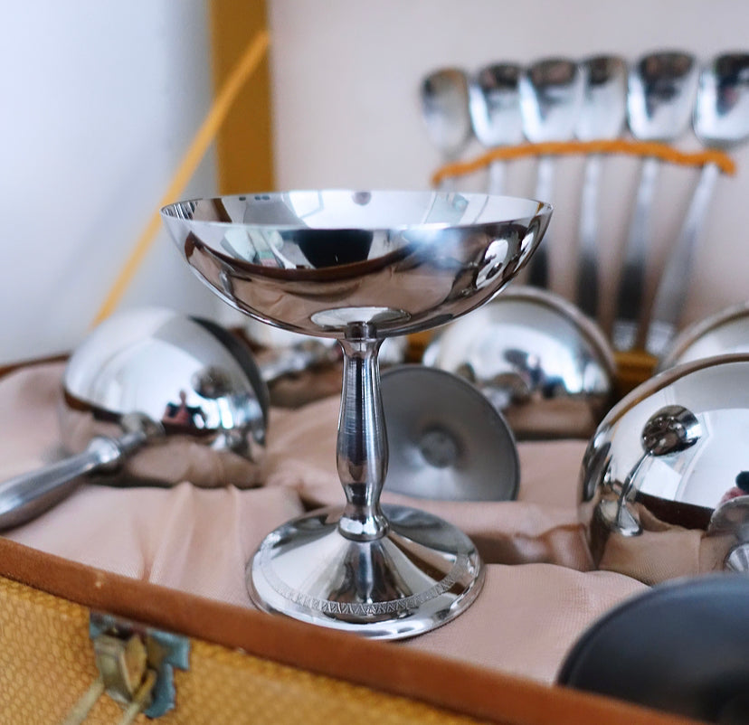 Set of six Italian stainless steel coupes & spoons