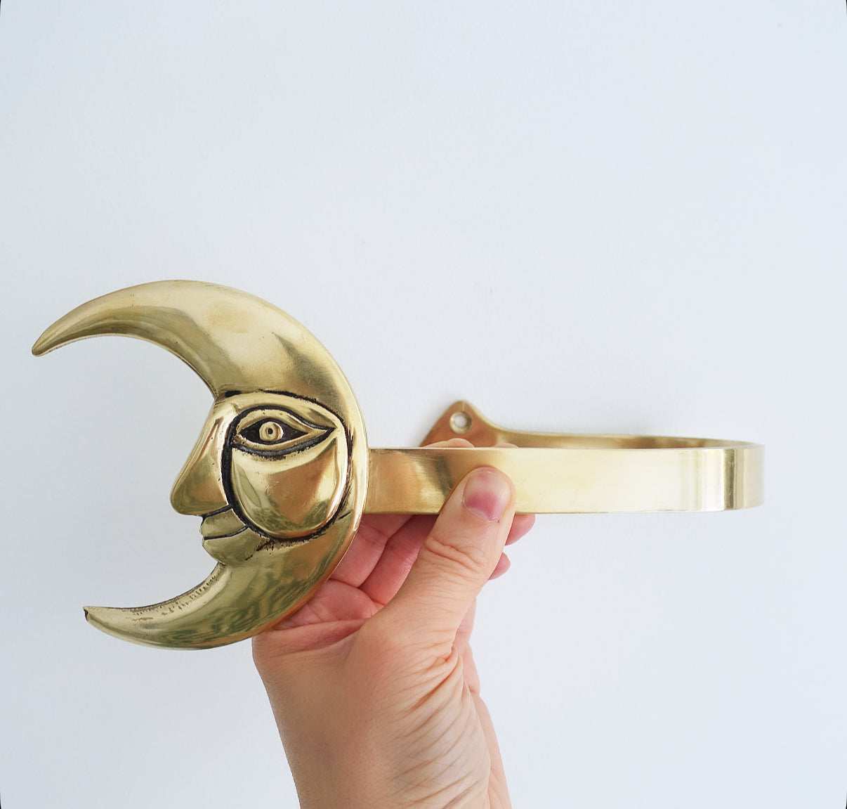 Brass moon curtain tie-backs