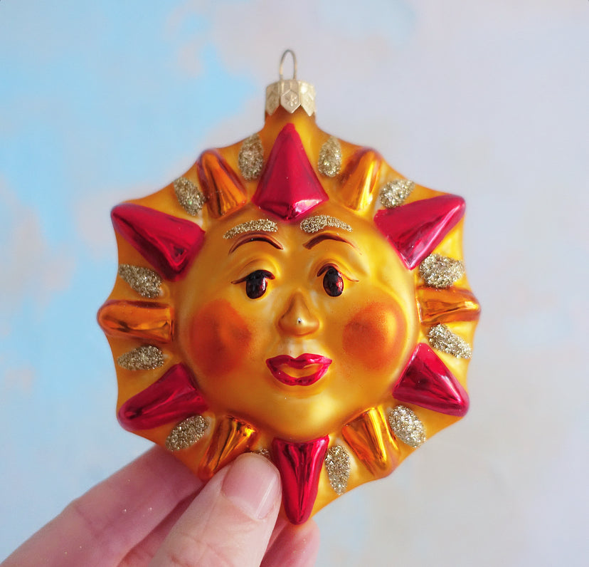 Pair of vintage celestial glass baubles