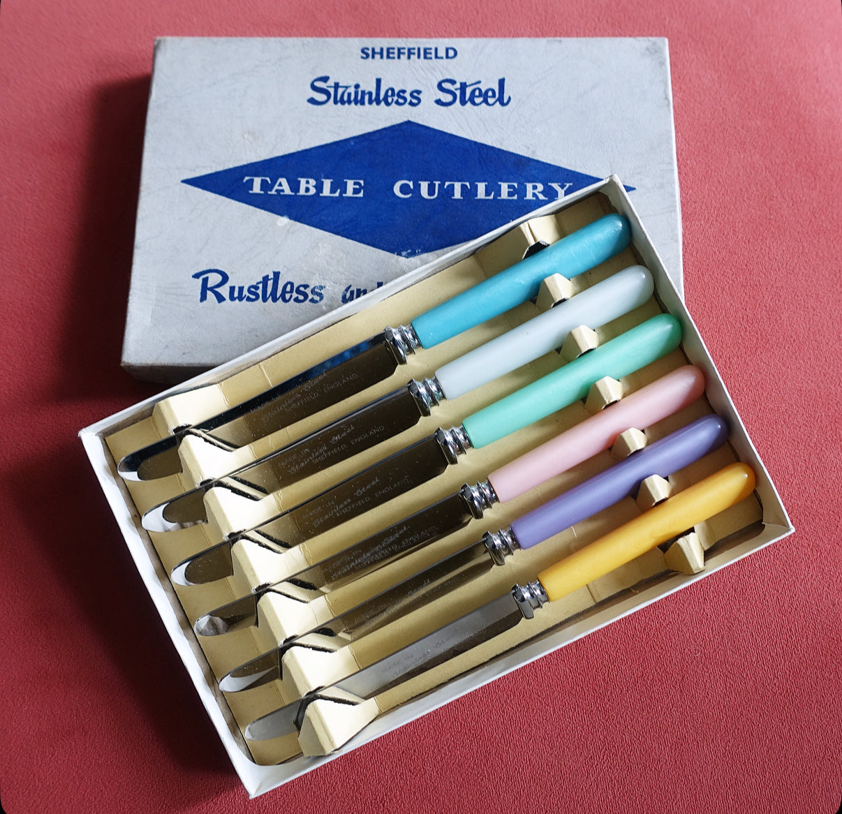 Set of six pastel tea knives