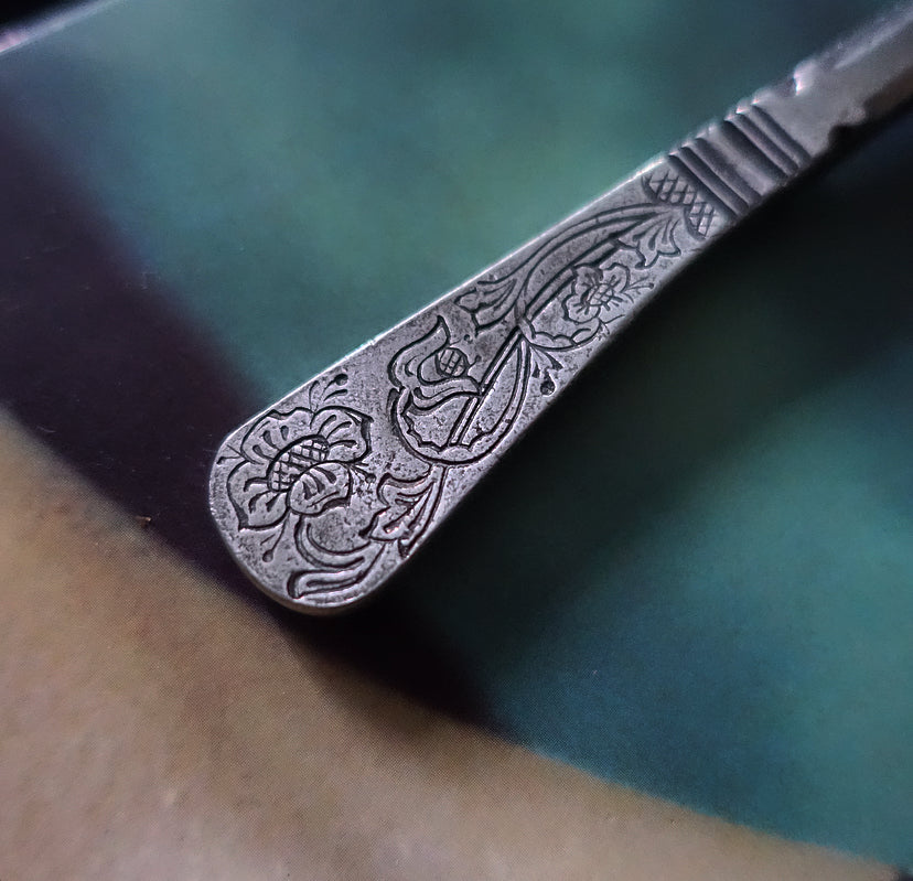 MCM Norwegian pewter candle snuffer