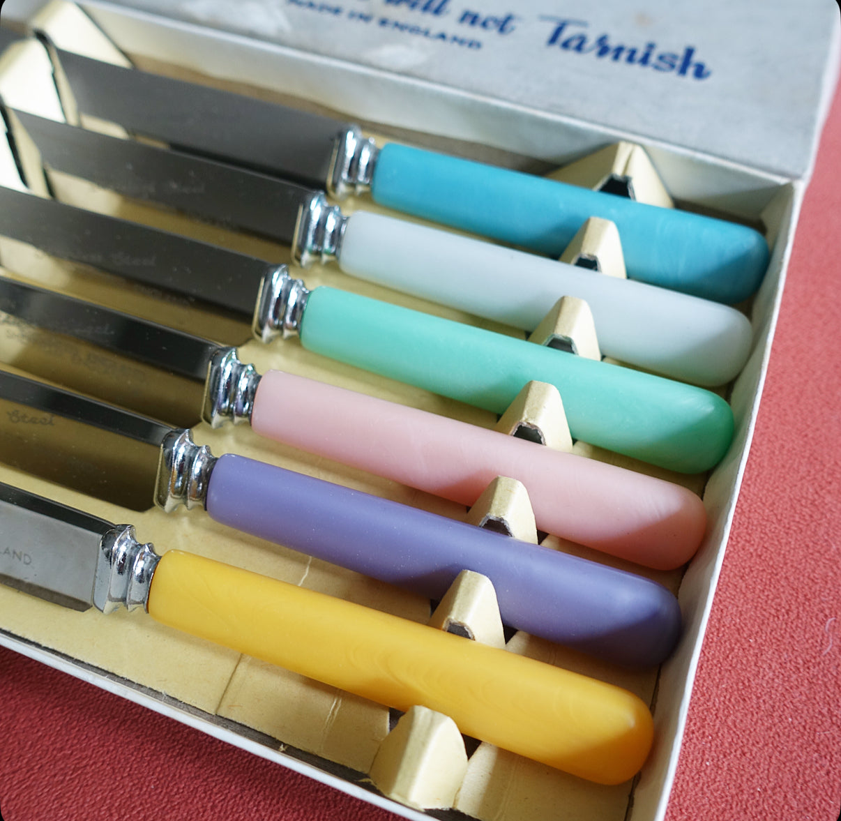 Set of six pastel tea knives