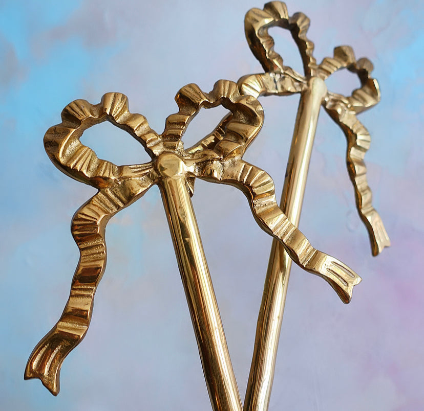 Large Pair of Hollywood Regency Brass Bow Candle Sconces