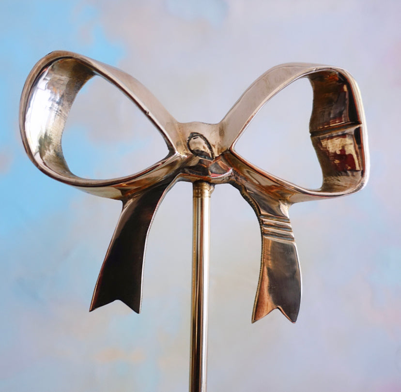 Pair of Hollywood Regency Brass Bow Candle Sconces