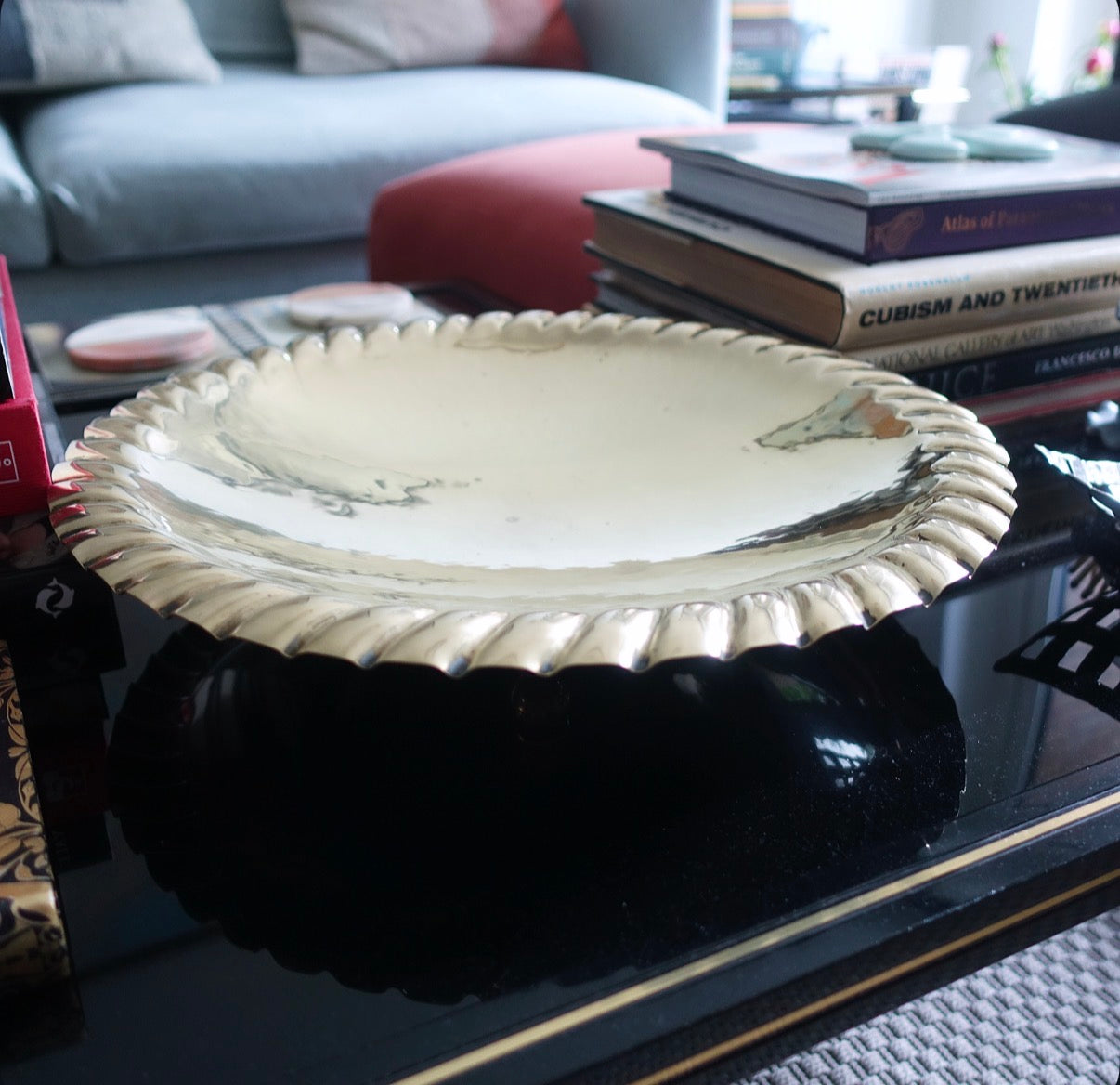 Large decorative brass bowl with ball feet