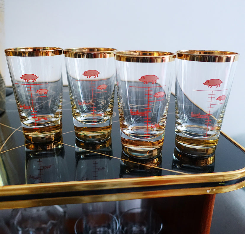 Set of four large novelty shot glasses