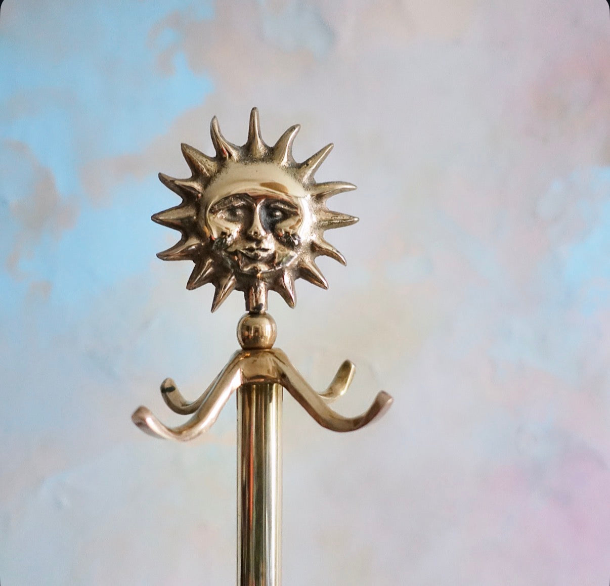 Brass sun stand