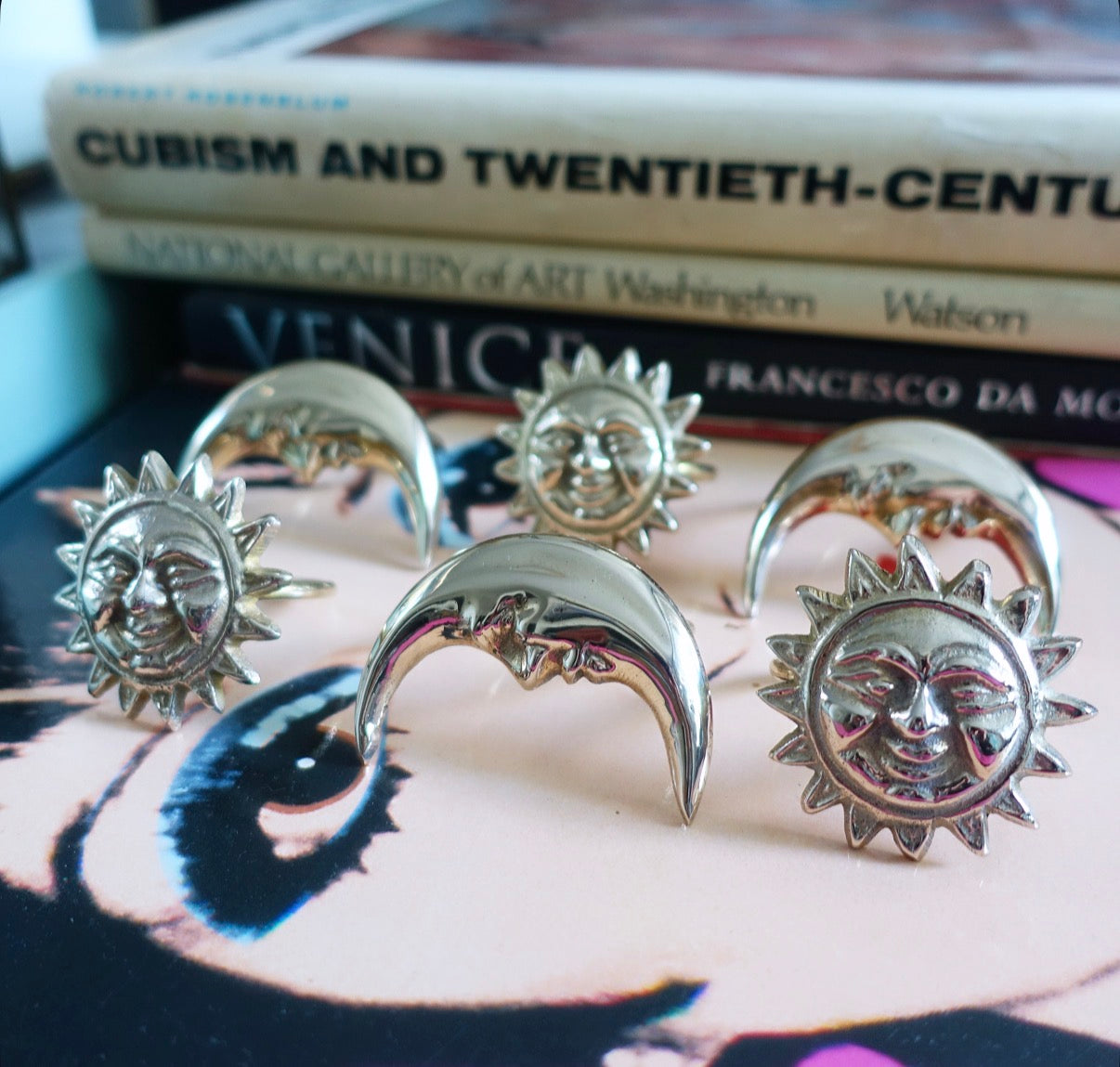 Celestial brass napkin ring set