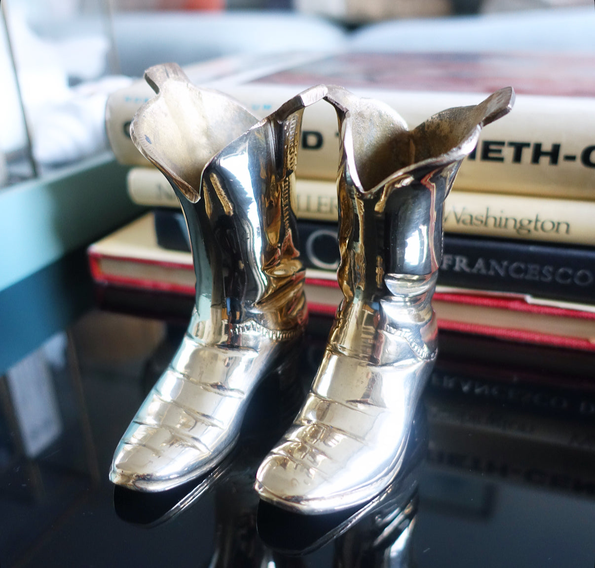 Miniature brass cowboy boots