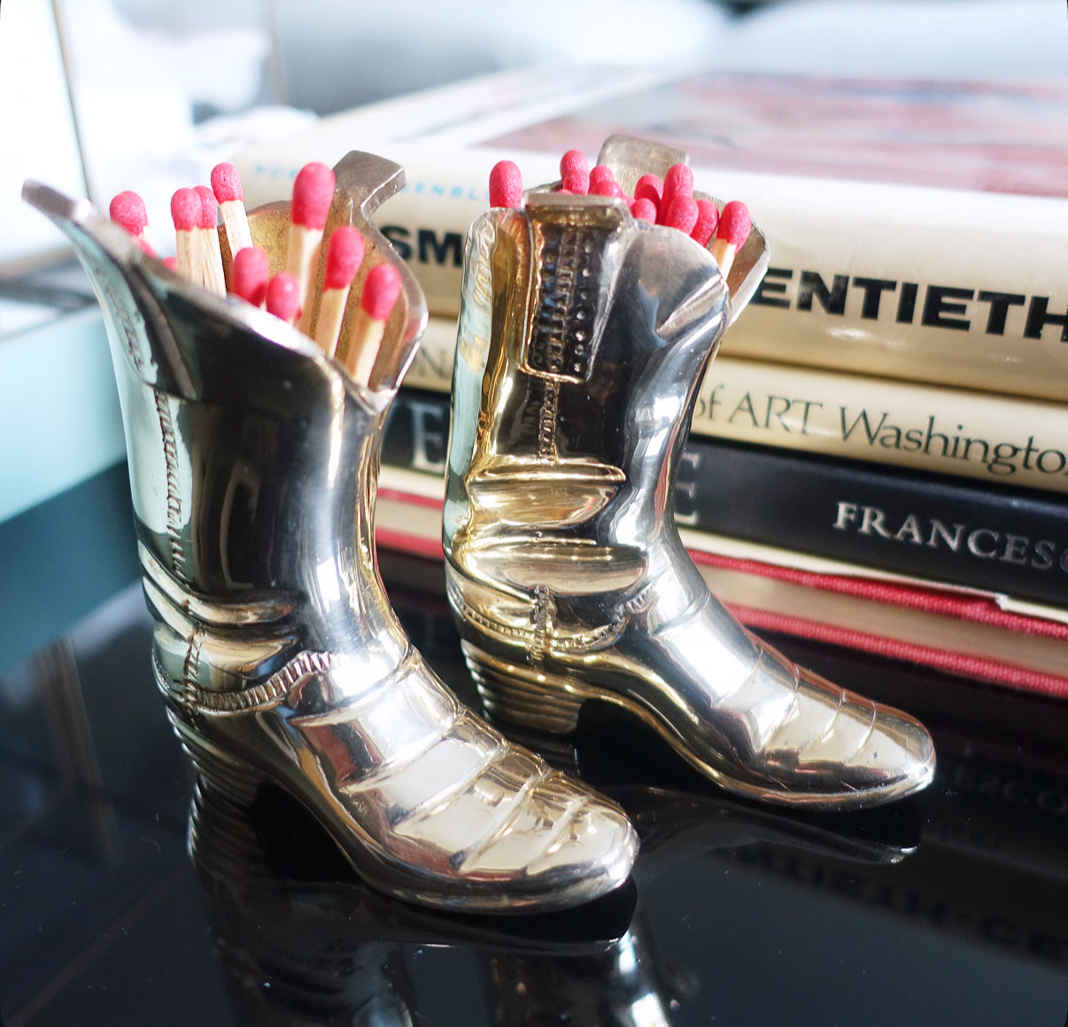 Miniature brass cowboy boots