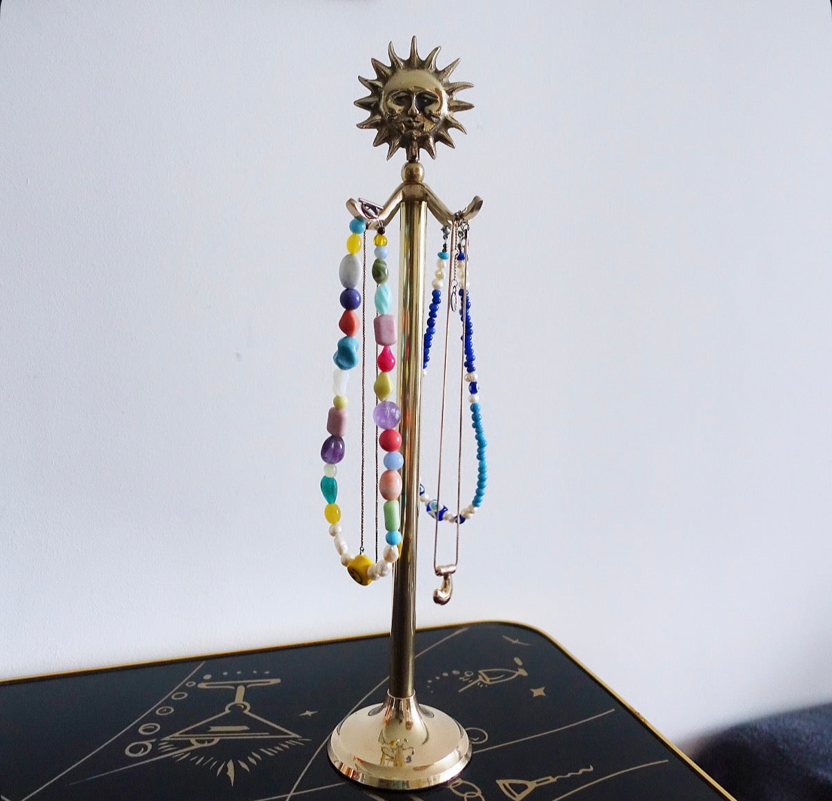 Brass sun stand