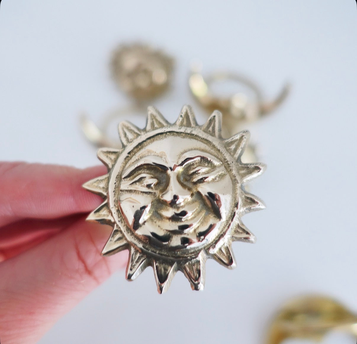Set of six Celestial brass Sun & moon napkin rings