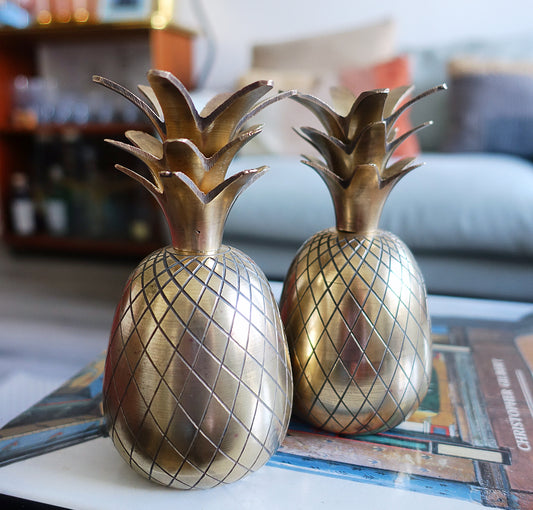 Pair of small brass pineapples