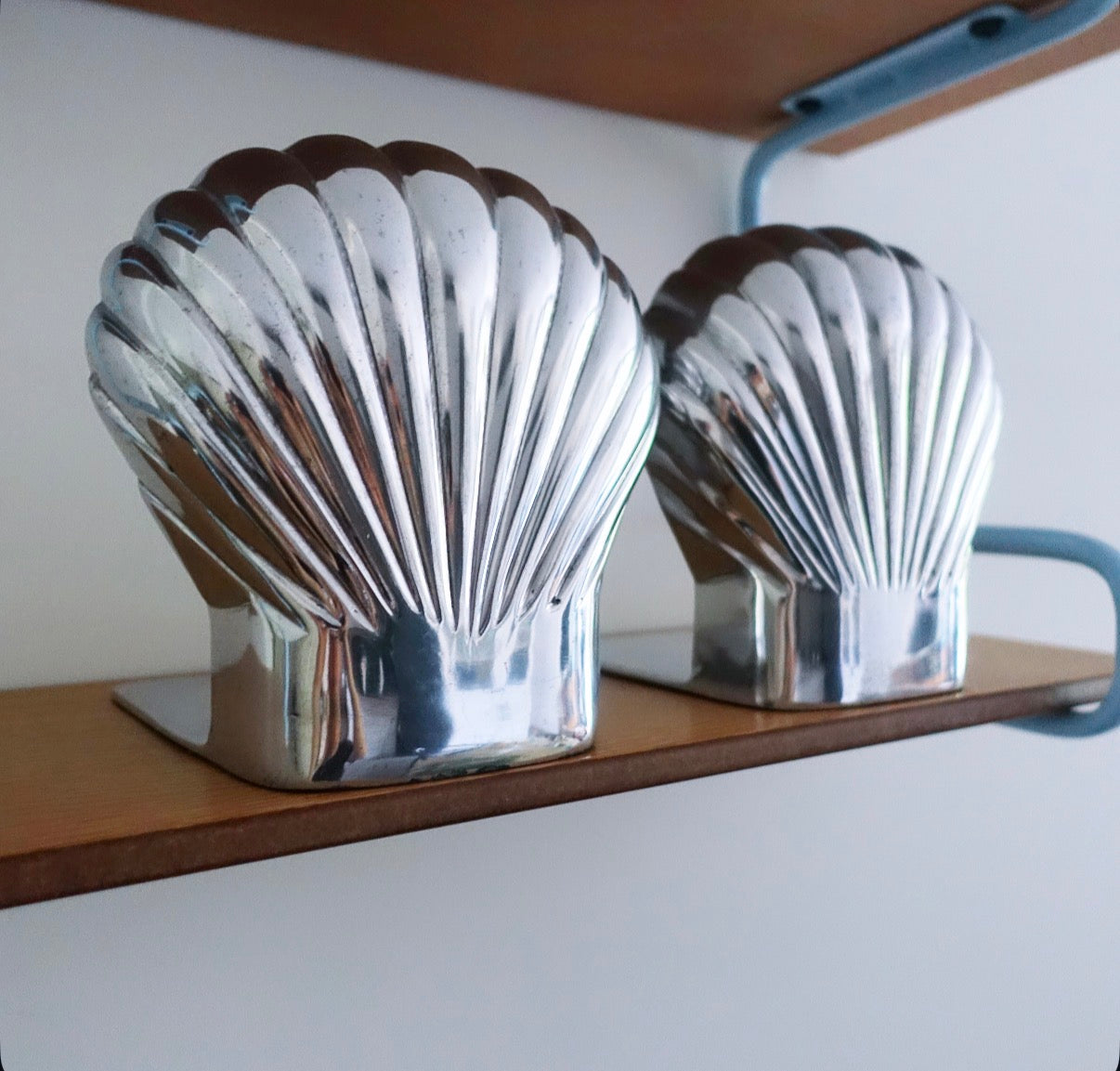 Pair of large aluminium scallop shell bookends