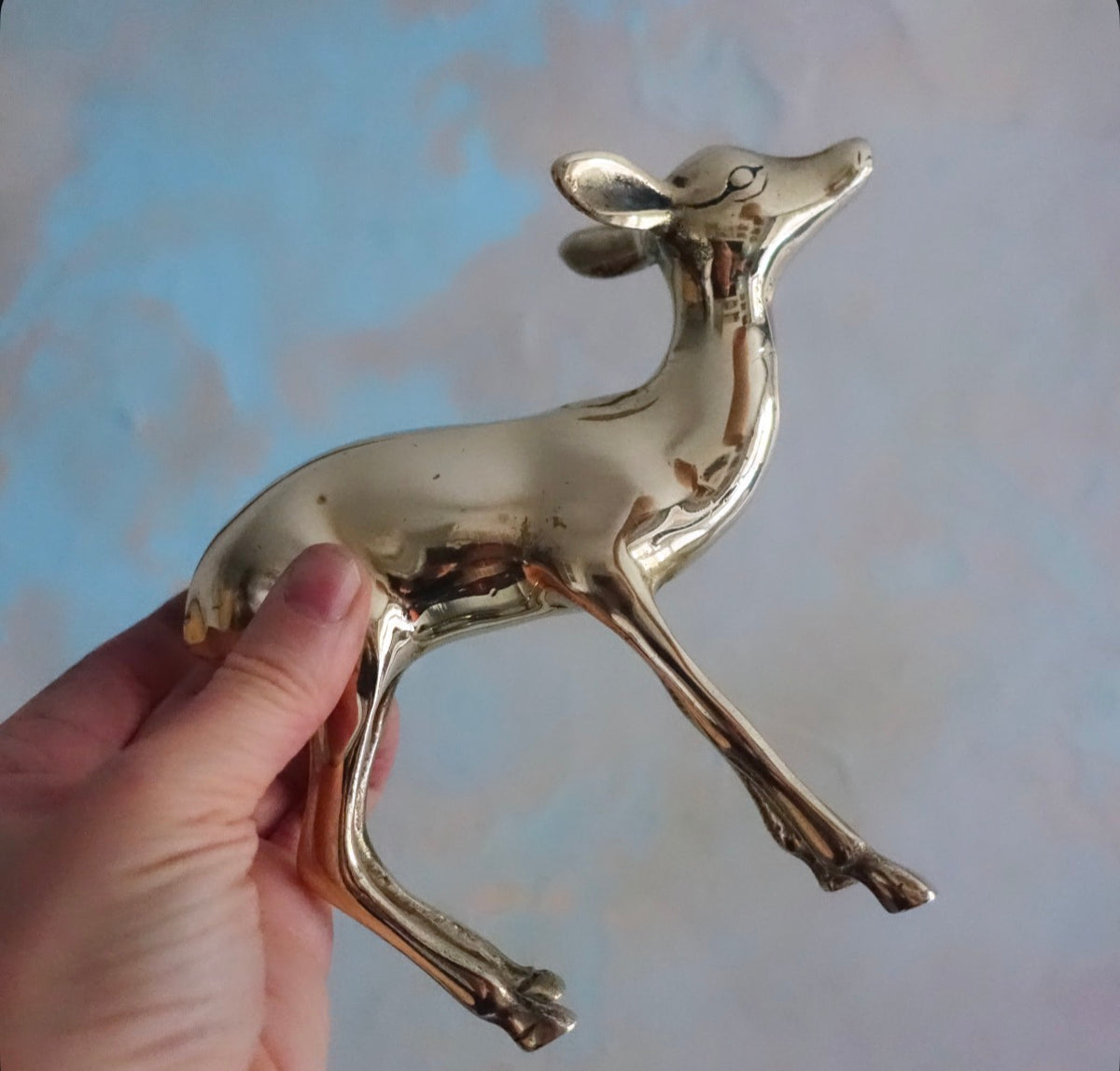Pair of decorative brass deer