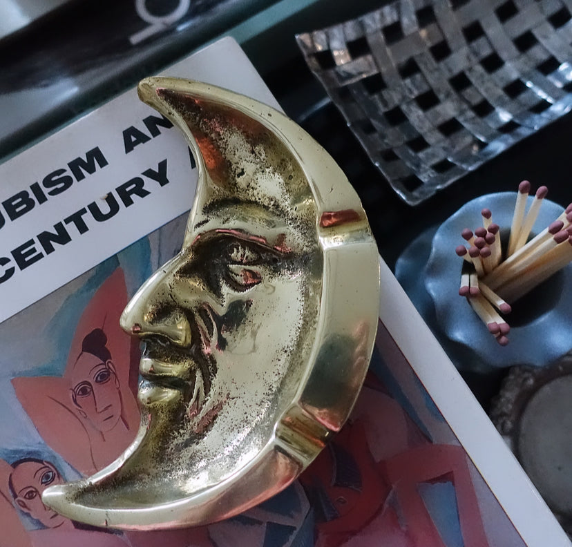 Brass man in the moon dish