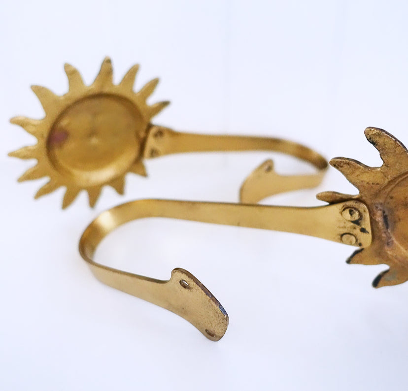 Pair of brass sun curtain tie-backs