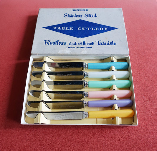 Set of six pastel tea knives