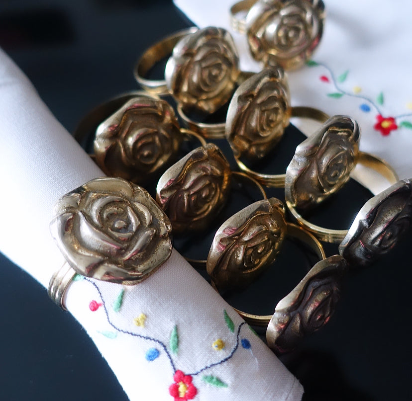 Set of 10 brass rose napkin rings