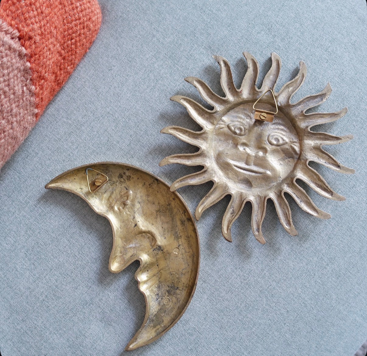 Brass sun & moon wall plaque set