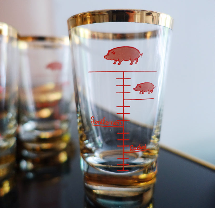 Set of four large novelty shot glasses