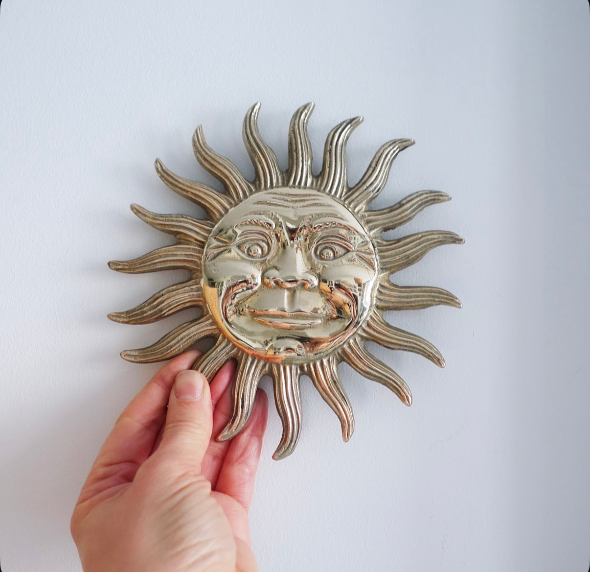 Brass sun & moon wall plaque set