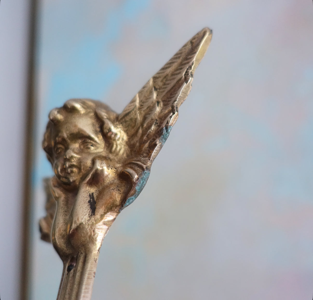 Brass cherub candle sconces