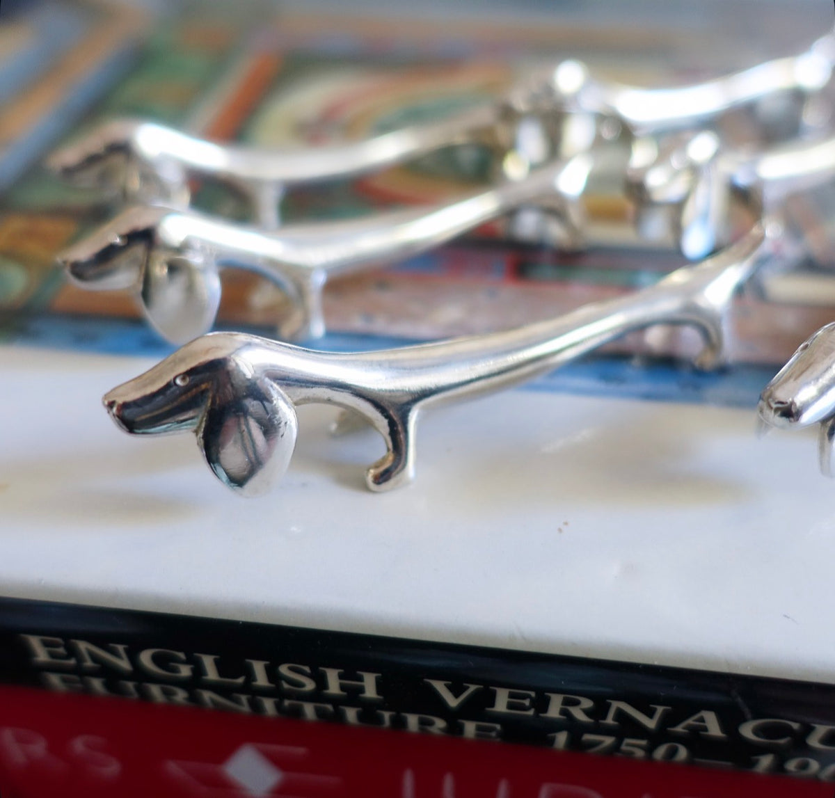 Set of six Dachshund cutlery rests