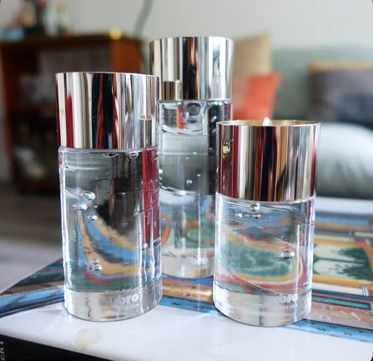 Set of three Nybro Sweden glass candle holders