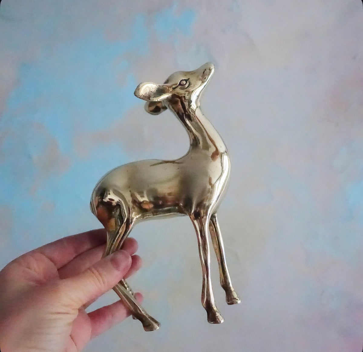 Pair of decorative brass deer