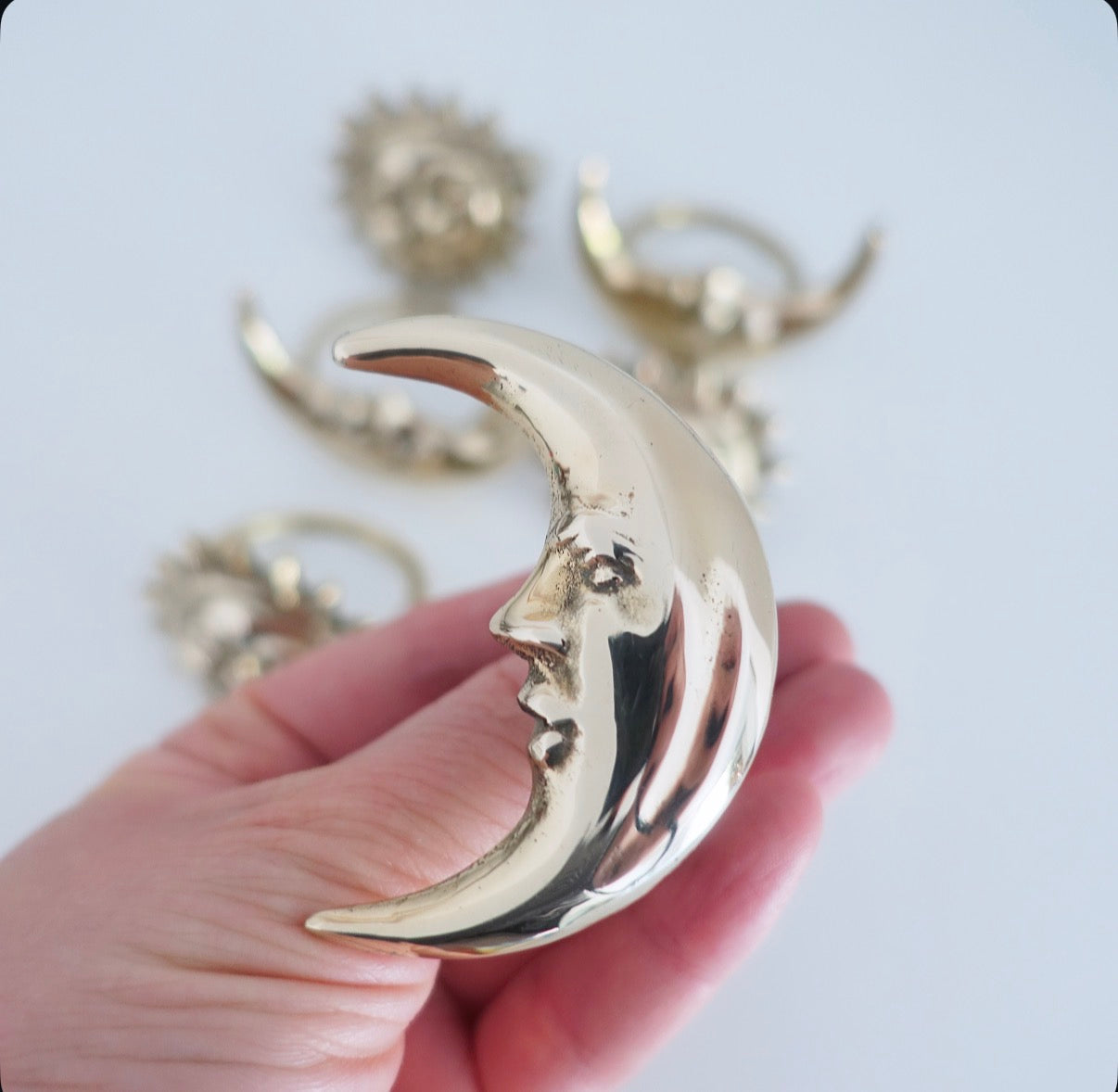 Set of six Celestial brass Sun & moon napkin rings