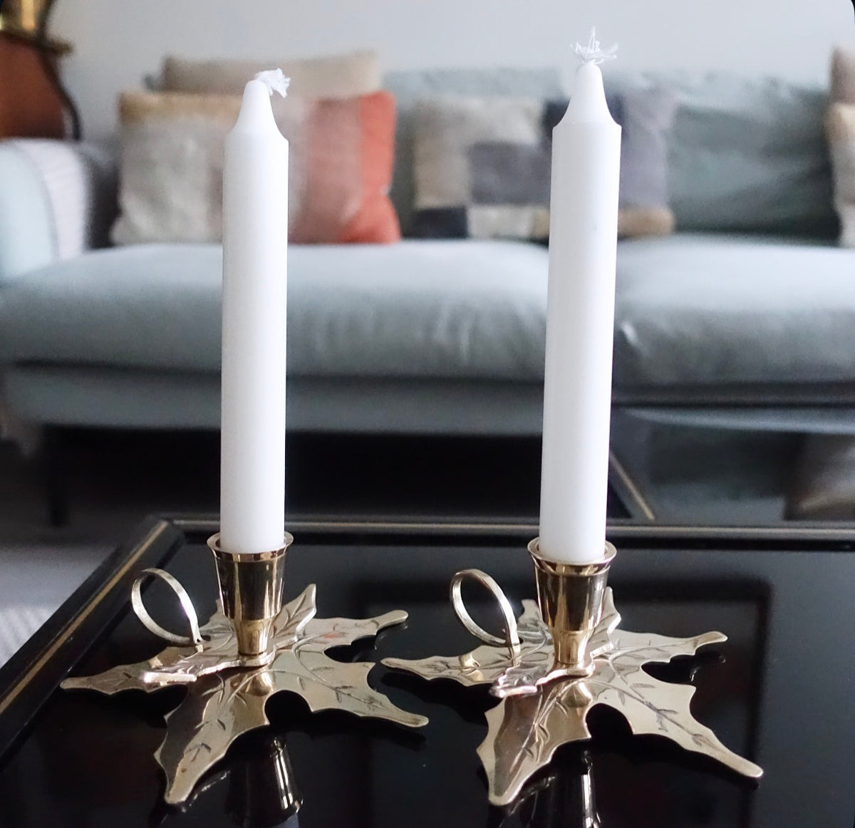 Pair of brass Holly candle holders