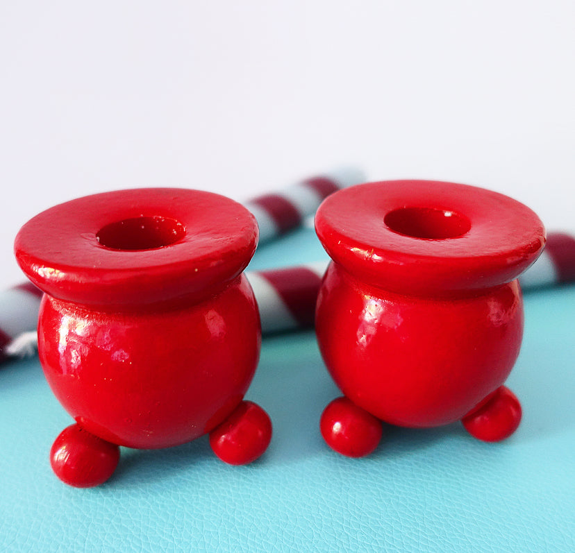 Pair of Swedish folk art candle holders