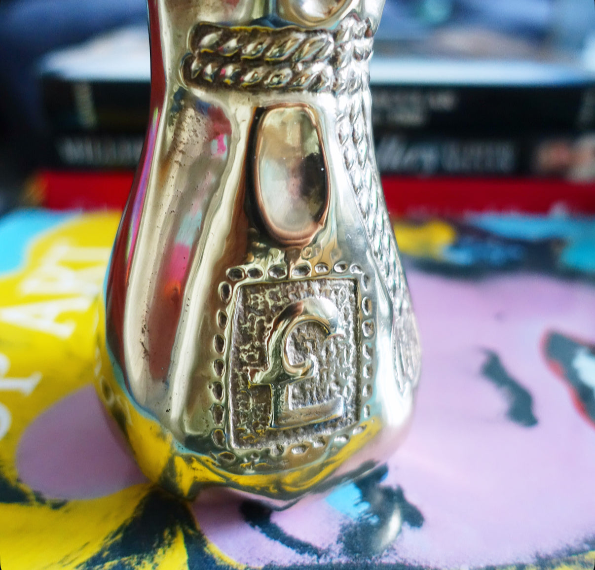 Brass swag bag coin bank