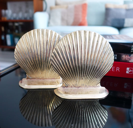 Pair of brass shell bookends