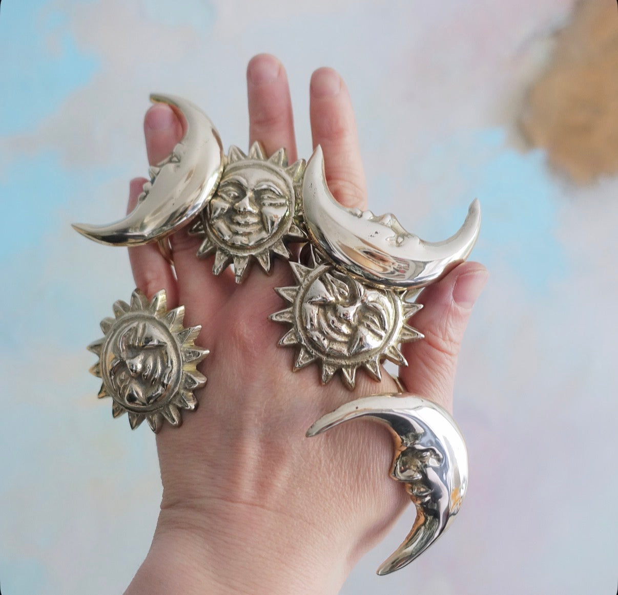 Celestial brass napkin ring set