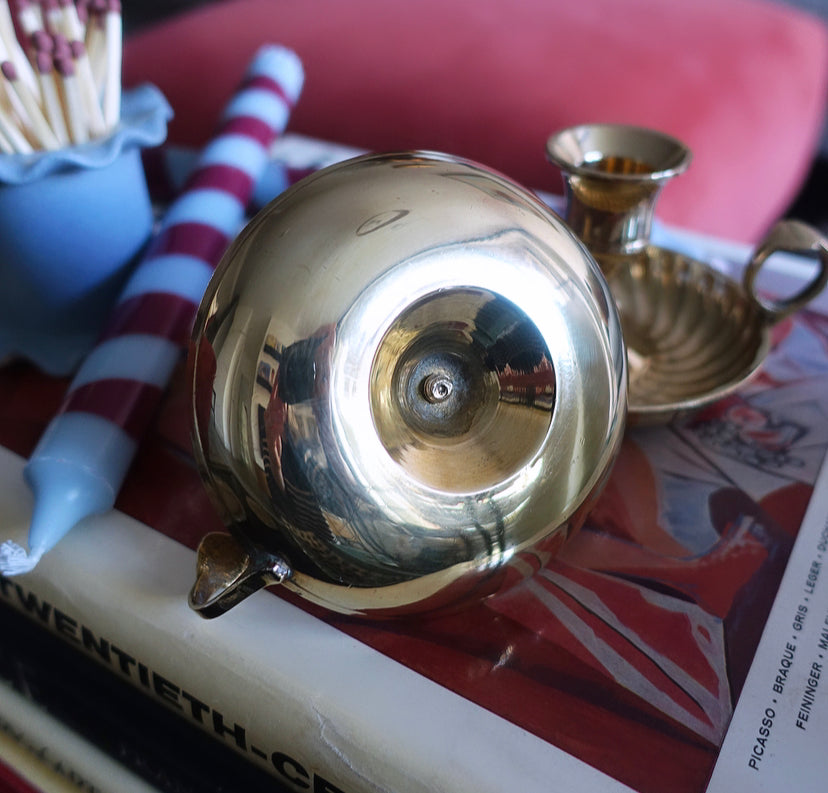 Pair of brass swirl candle holders