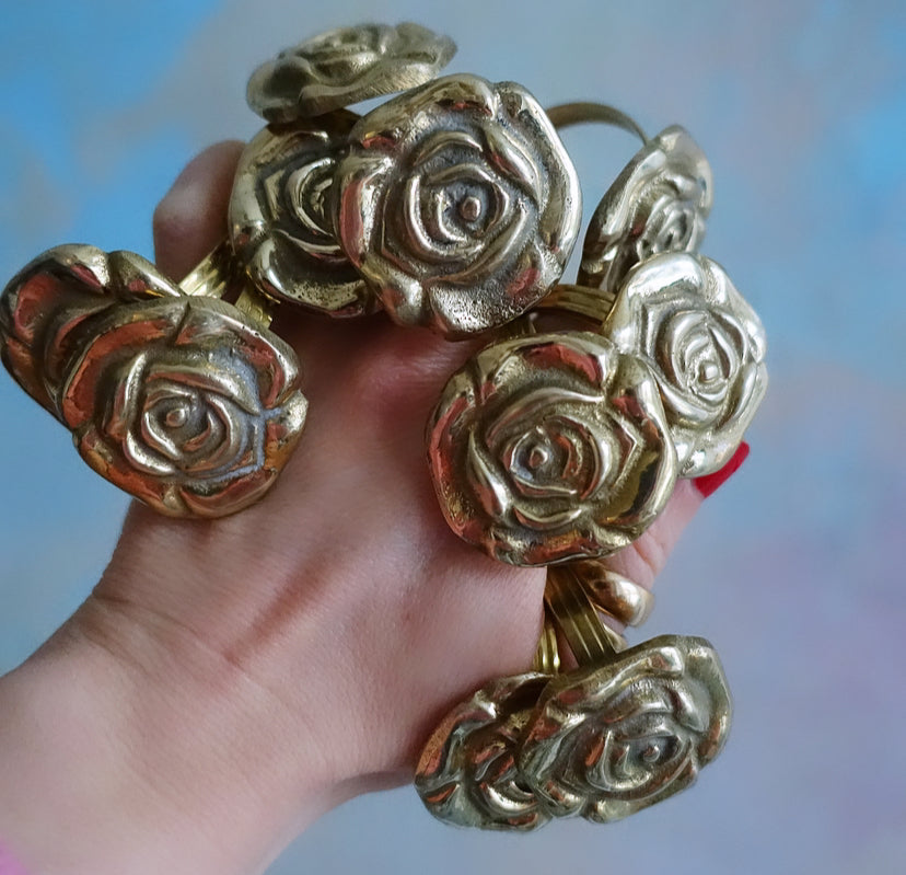 Set of 10 brass rose napkin rings