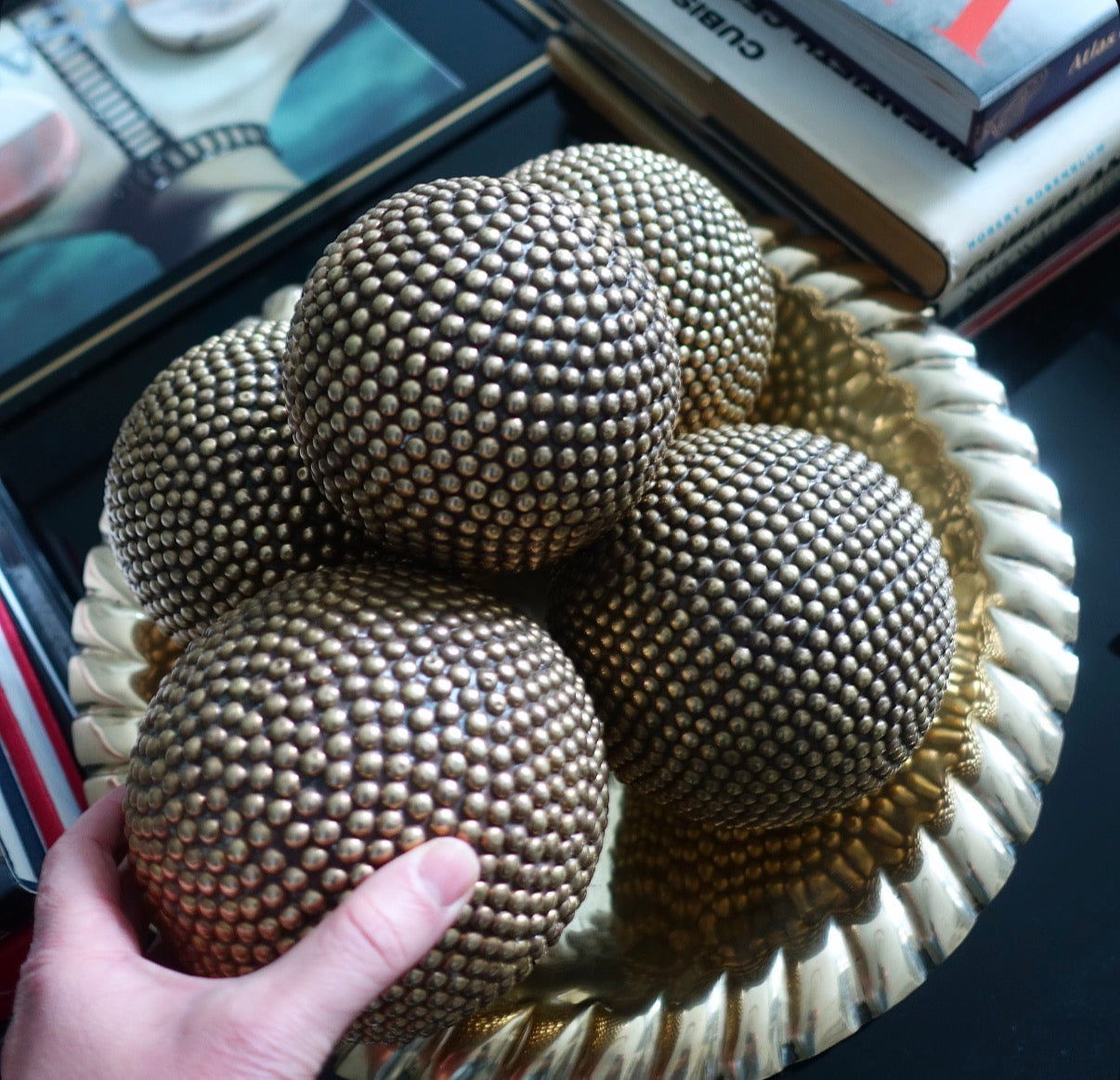 Set of five decorative brass studded balls