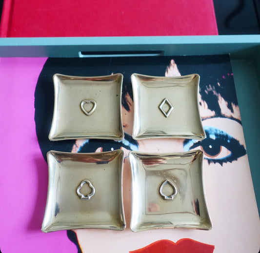 Set of four brass card suit trinket dishes