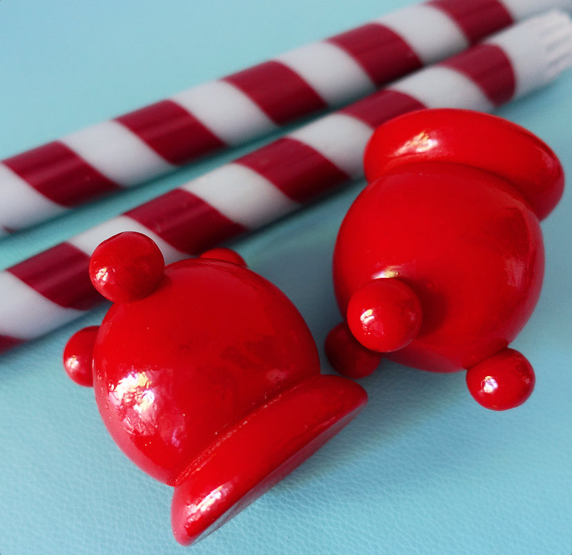 Pair of Swedish folk art candle holders