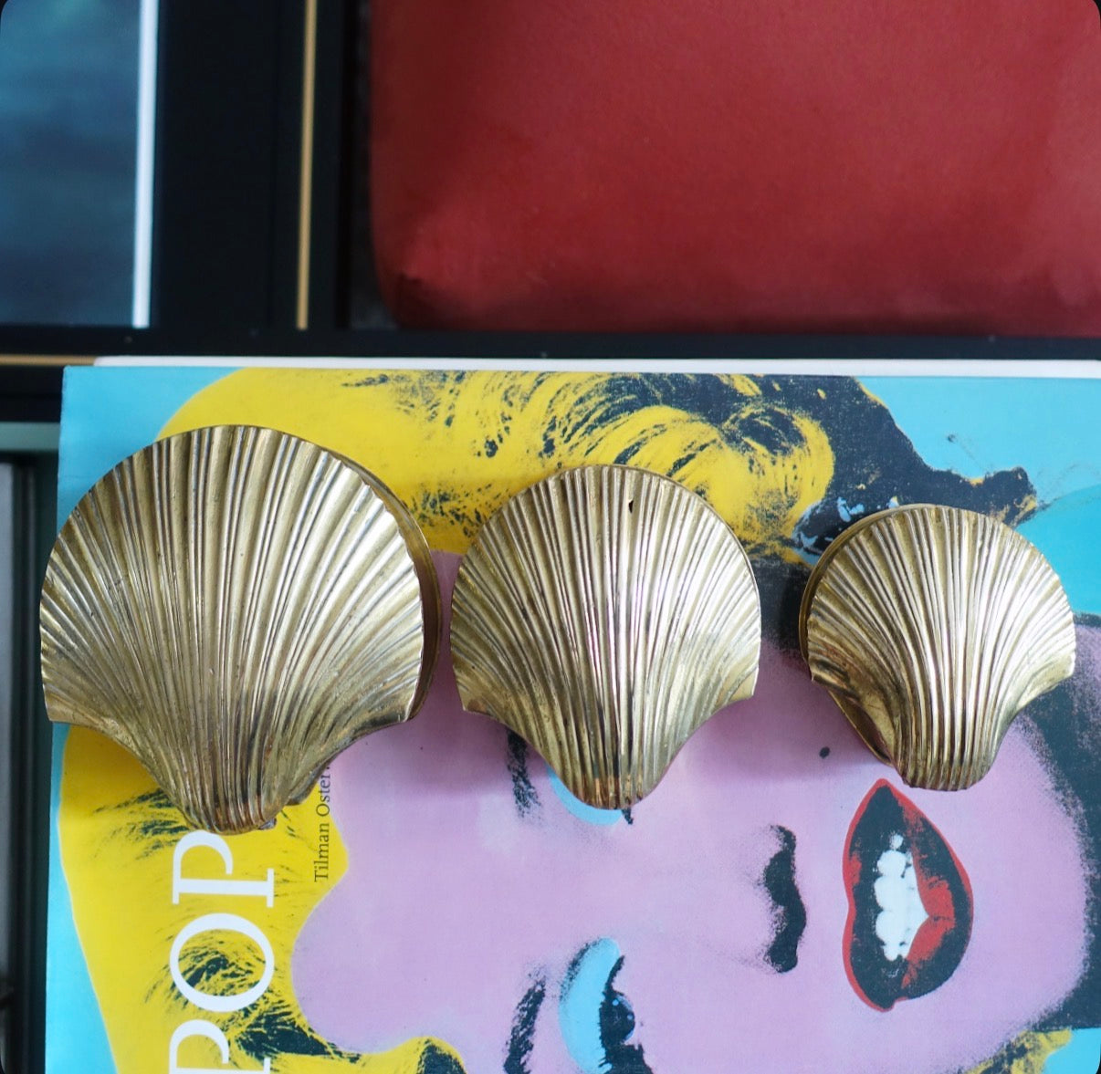 Set of three brass scallop shell trinket boxes