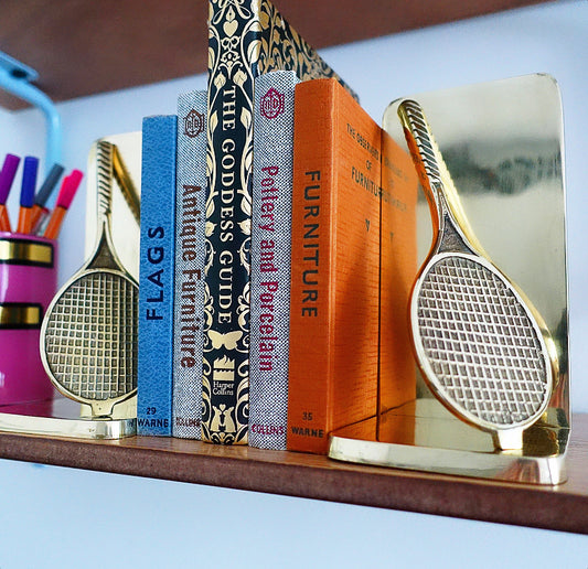 Pair of brass tennis racket bookends